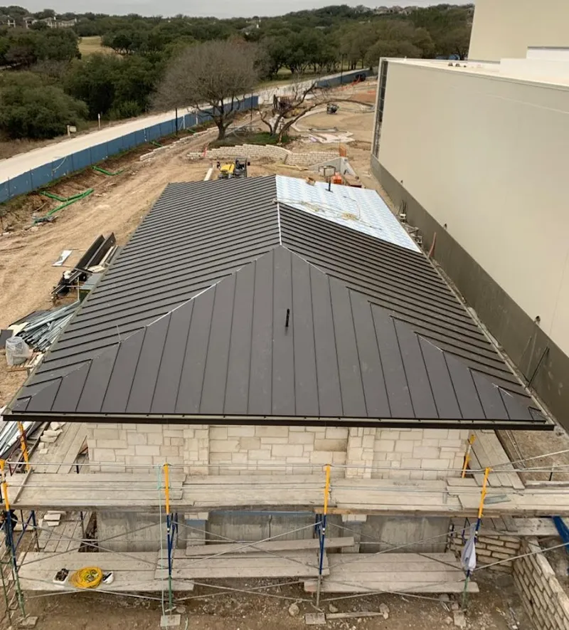 Metal roof new construction with scaffolding in Mena